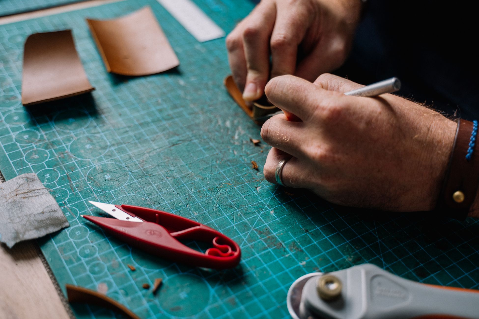 Hand-cutting leather for a custom saddle