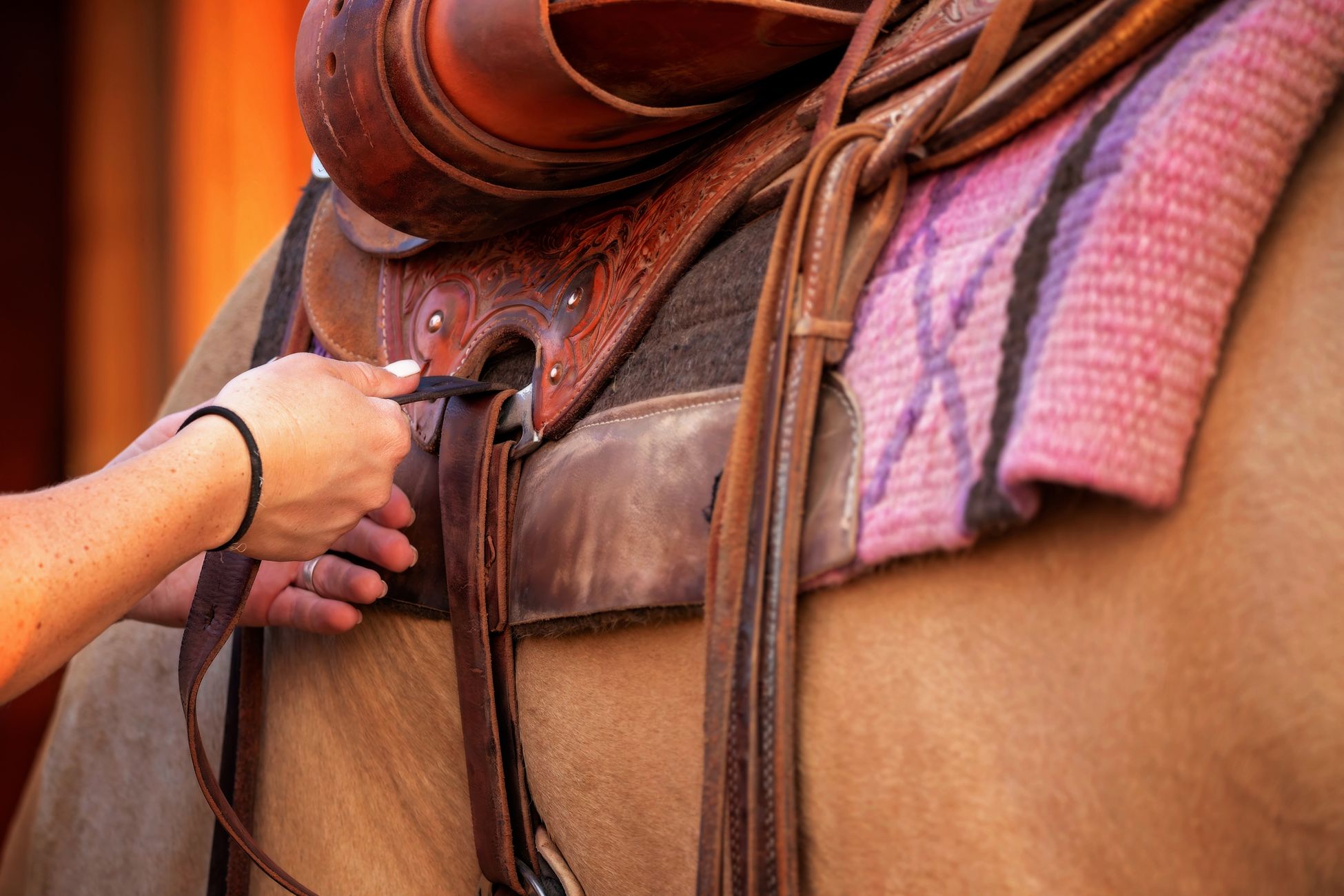 Hand-tooled leather detail on a Western saddle